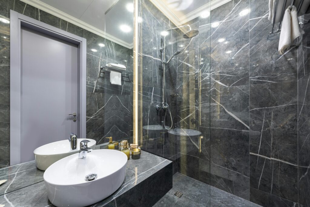 Luxurious bathroom with glass shower door